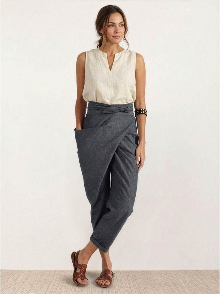 FJØRNA women's lightweight summer trousers with high waist, wide-leg design and front pockets, perfect for casual wear.