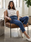 FJØRNA lightweight summer women's trousers with high waist, wide leg fit, and side pockets, styled for casual comfort.