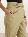 FJØRNA women's lightweight summer trousers with high waist, wide leg fit, and side pockets, designed for comfort and style.