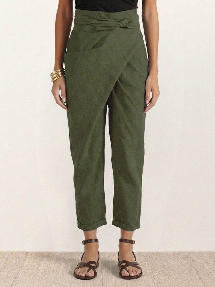 FJØRNA women's lightweight summer trousers with high waist, wide leg design, and side pockets, perfect for casual warm-weather wear.