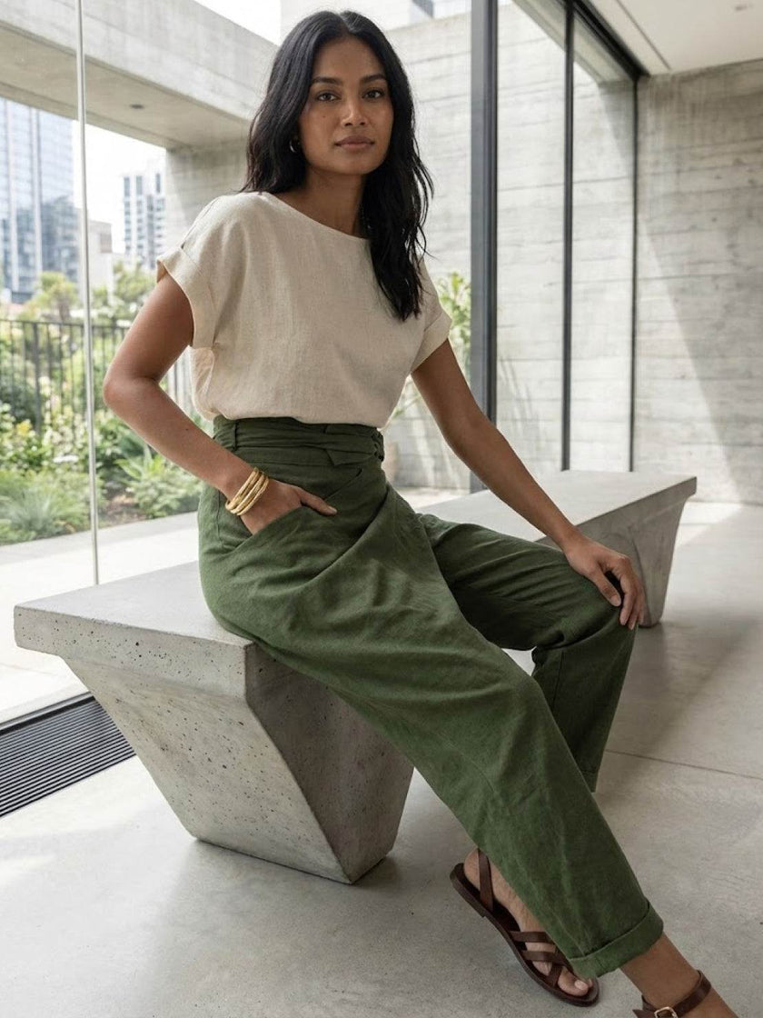 FJØRNA lightweight summer women’s high-waist wide-leg trousers with pockets, made from comfortable, breathable fabric.