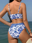 Women's high waist floral V-neck bikini by FJØRNA featuring a vibrant flower pattern, perfect for summer beach outings.