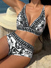 Women's high waist floral V-neck bikini by FJØRNA, featuring a colorful floral pattern and stylish design for summer swimwear.