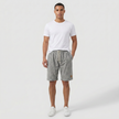 Men's linen shorts by FJØRNA with elasticated waist and drawstring, perfect for summer beachwear and casual outings.