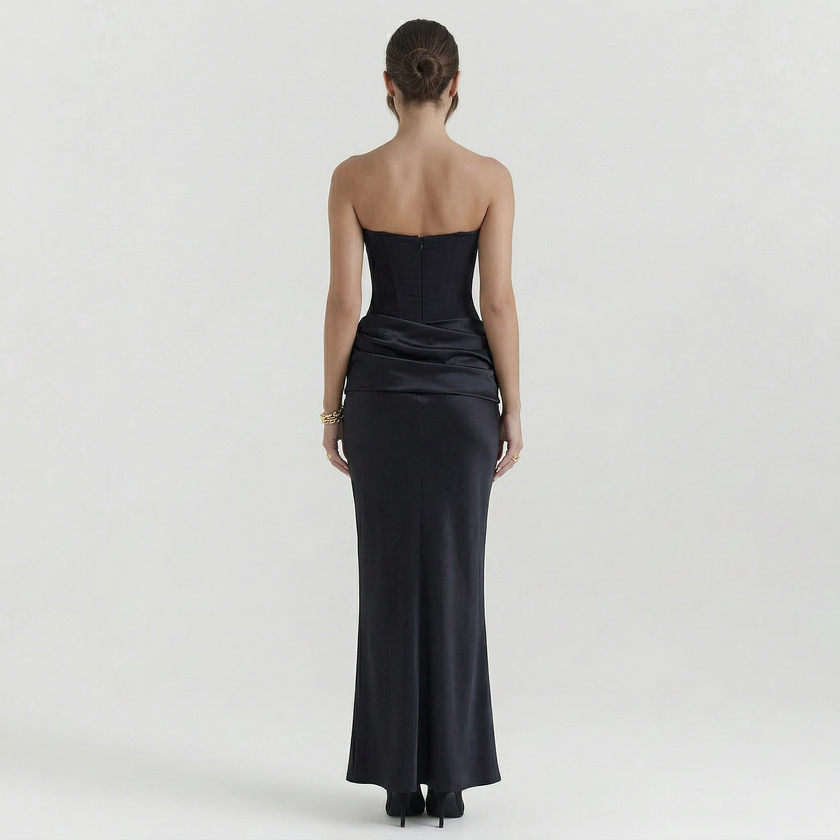 FJØRNA women's strapless maxi corset dress with fitted bodice and flowing skirt, elegant evening wear for special occasions.