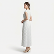 FJØRNA women's polka dot maxi dress with round neckline and A-line silhouette, flowing and stylish for casual or formal wear.