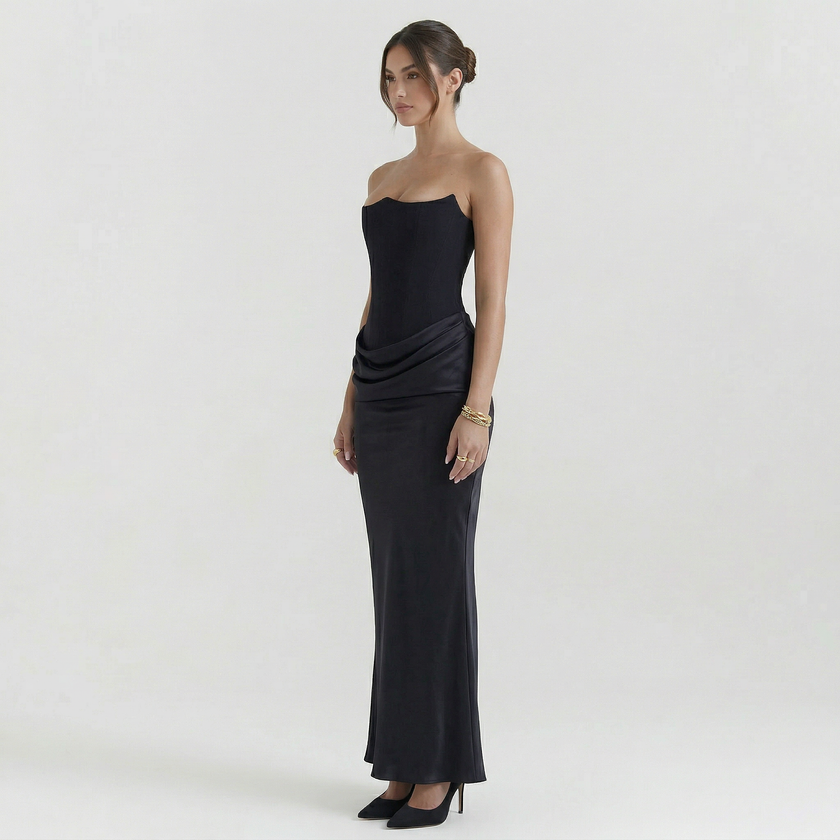 FJØRNA women's strapless maxi dress with corset bodice and flowing skirt, elegant evening wear for formal occasions.