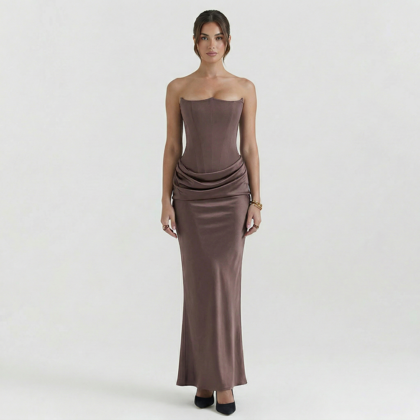 FJØRNA women's strapless maxi dress with corset bodice and flowing skirt, elegant evening wear for formal occasions.