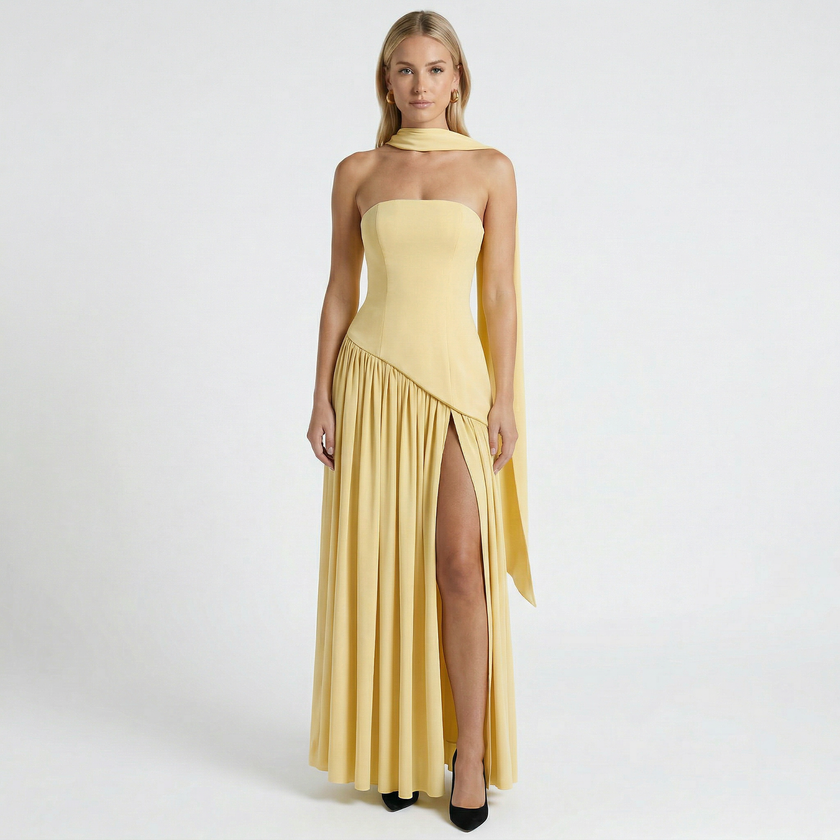 FJØRNA women's elegant strapless maxi dress with flowing fabric and fitted bodice, perfect for formal occasions.