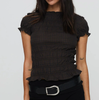 FJØRNA women's plaid ruffle-detail top featuring a white blouse design with ruffled accents and a stylish, feminine fit.