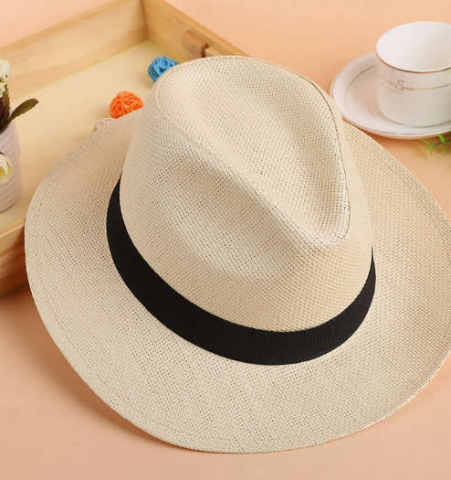 Unisex handmade Panama hat by FJØRNA, natural straw material, wide brim, stylish and breathable men's hat for warm weather.