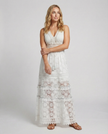 FJØRNA bohemian lace maxi dress with tiered skirt and tassel waist, flowing and lightweight for boho-inspired style.