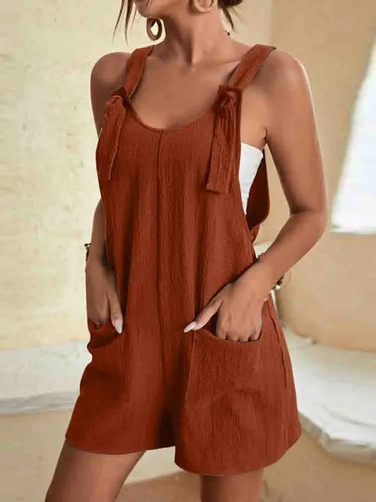 FJØRNA Daisy women's casual romper shorts with pockets, lightweight fabric, and a relaxed fit, perfect for warm weather.