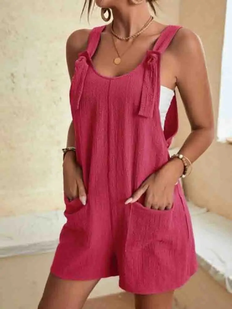 FJØRNA Daisy women's casual romper shorts with pockets, featuring a relaxed fit and stylish design, shown on a model.