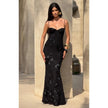 Women's floral jacquard corset maxi dress by FJØRNA, featuring a fitted bodice and flowing skirt, ideal for elegant occasions.
