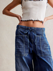 FJØRNA women's cotton pull-on jeans, casual pants with a comfortable fit, shown on a model in a relaxed pose.
