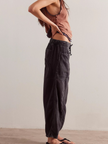 FJØRNA women's cotton pull-on jeans, casual pants with a comfortable fit, shown in a relaxed style.