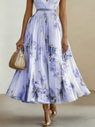 FJØRNA women's white sleeveless pleated dress with printed V-neck design, lightweight fabric, and stylish fashion appeal.