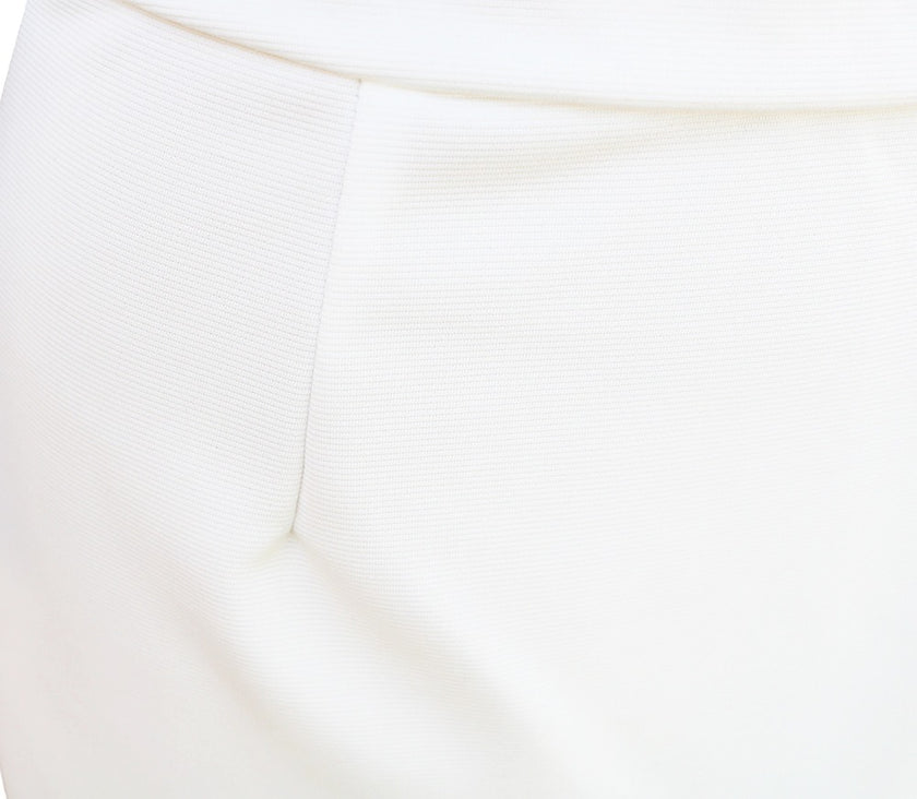 White FJØRNA dress with bat sleeves and waist-cinching design, elegant and fashionable for a stylish look