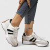 FJØRNA Danyzheiah orthopedic sneakers with supportive design, white and gray color, and breathable mesh material.