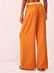 FJØRNA linen blend wide-leg women's trousers with drawstring waist, lightweight and relaxed fit, in natural fabric with a flowy silhouette.