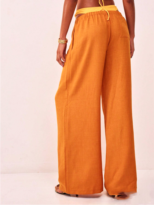 FJØRNA linen blend wide-leg women's trousers with drawstring waist, lightweight and relaxed fit, in natural fabric with a flowy silhouette.