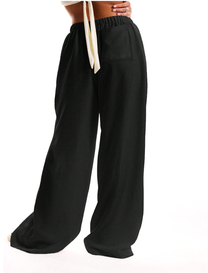 FJØRNA linen blend wide-leg women's trousers with drawstring waist, relaxed fit, and lightweight fabric.