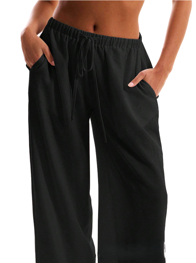 FJØRNA linen blend wide leg trousers for women with drawstring waist, relaxed fit, and lightweight fabric.