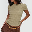FJØRNA women's plaid top with ruffle details, featuring a stylish button-up design and long sleeves.