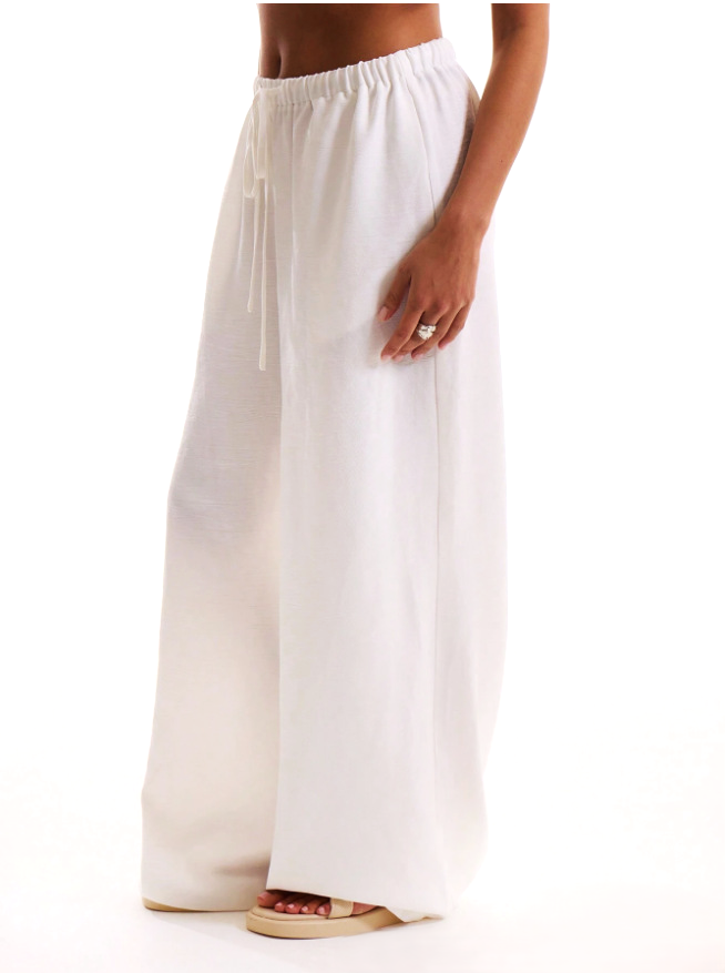 FJØRNA linen blend wide-leg trousers for women with drawstring waist, relaxed fit, and lightweight fabric.