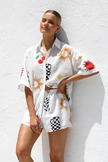 FJØRNA women's linen blend co-ord set with stylish tops, featuring lightweight fabric and modern design.