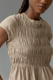 FJØRNA women's linen peplum blouse with long sleeves and button front, stylish and breathable top for women.