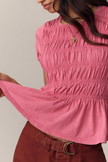 FJØRNA women's linen top with ruffle detail, lightweight and breathable blouse with feminine ruffle accents on the shoulders.