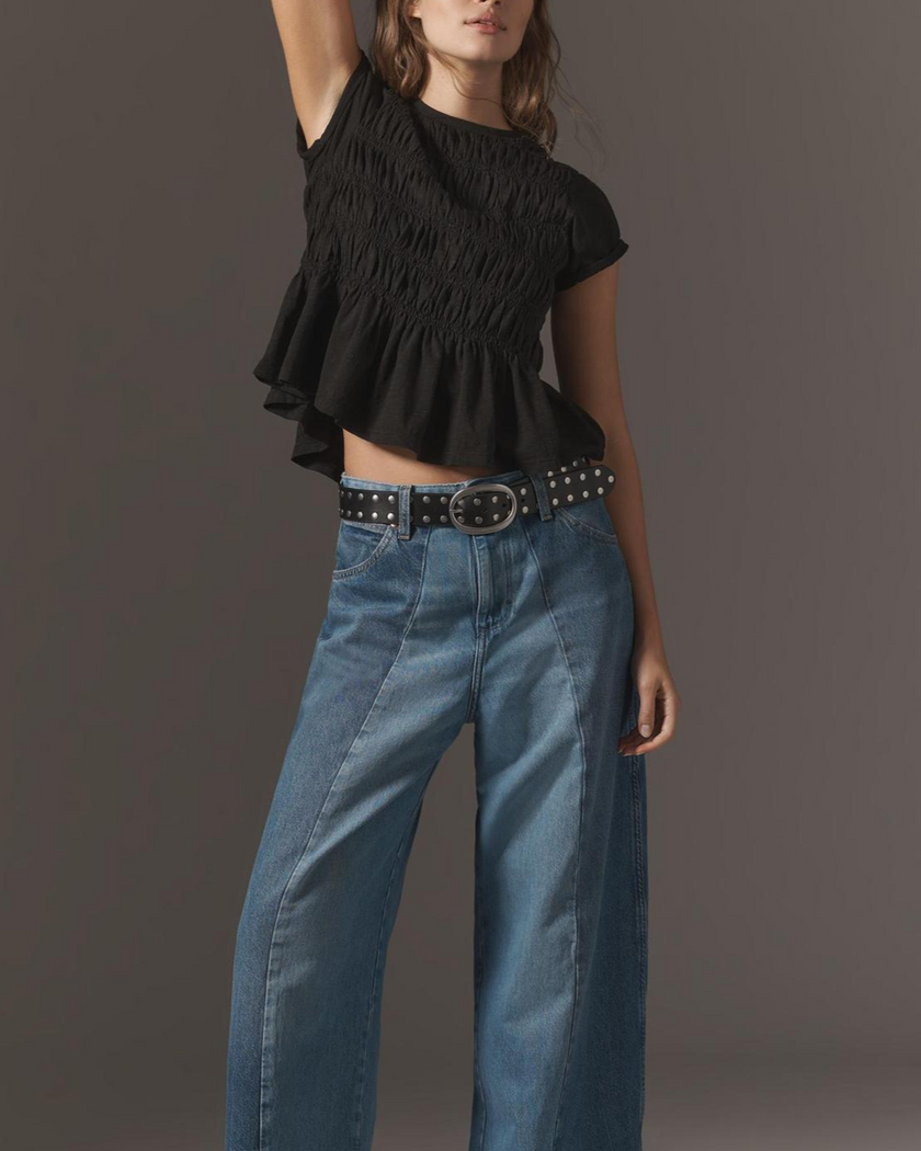 FJØRNA women's linen top with ruffle detail, lightweight and breezy, featuring a relaxed fit and elegant design.