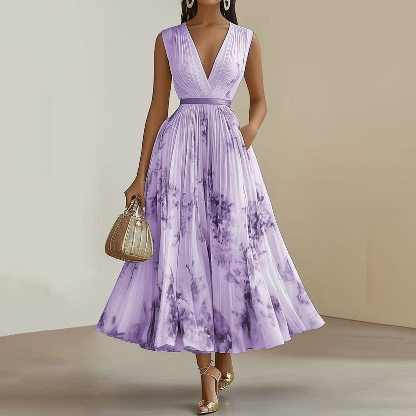 FJØRNA women's white sleeveless pleated dress with printed V-neck design, stylish and perfect for summer or casual occasions.
