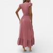 Women's sleeveless maxi dress by FJØRNA featuring a flowy fit and timeless style, perfect for elegant summer occasions.