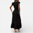 Women's sleeveless maxi dress by FJØRNA featuring a flowy fit and timeless style, perfect for elegant summer wear.
