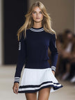 Navy blue FJØRNA mini dress for women, featuring a stylish and fitted design, ideal for casual and semi-formal occasions.