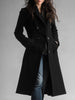 FJØRNA black midi wool coat for women with pockets, showcasing a stylish and cozy outerwear design.