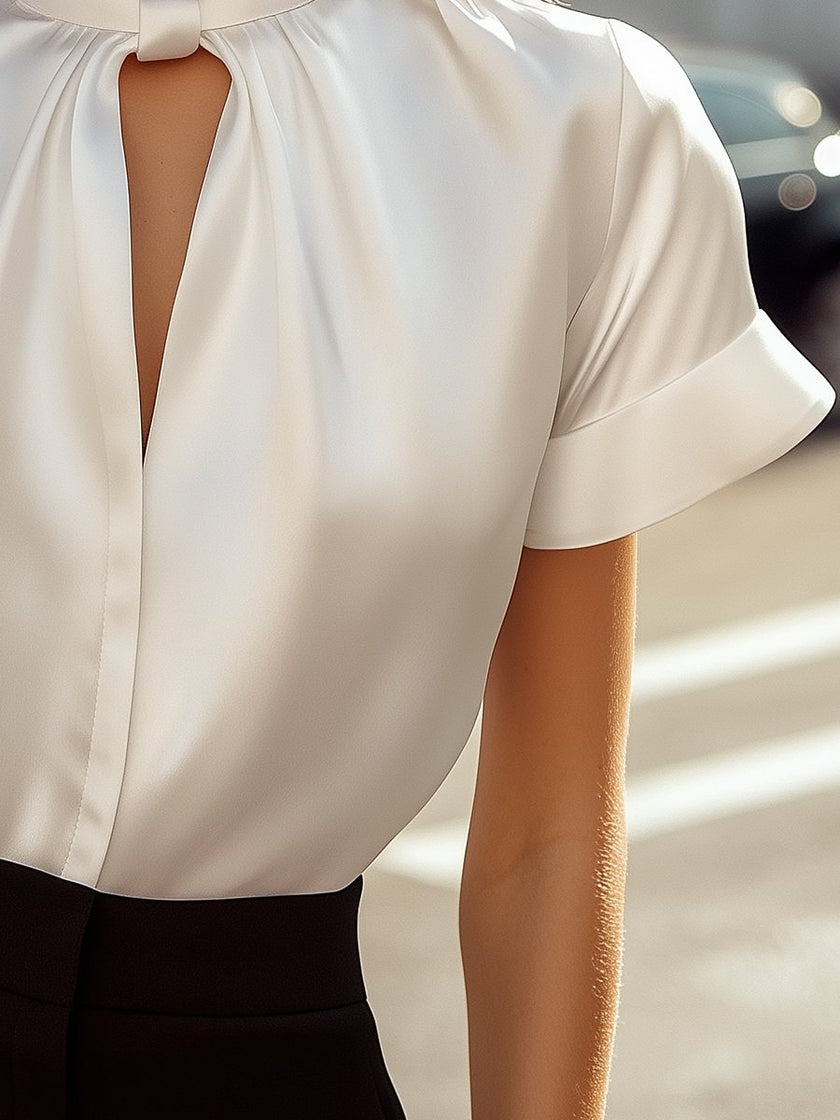 FJØRNA satin women’s high neck keyhole short sleeve blouse with a smooth, shiny fabric and elegant design.