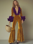 Gold velvet flared sleeve jumpsuit for women by FJØRNA, featuring a fitted bodice and wide-leg pants, perfect for evening wear.