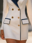 White double-breasted blazer dress with navy lapel by FJØRNA, featuring a tailored fit and stylish navy accents.