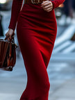 Elegant red FJØRNA turtleneck knit dress for women, showing a fitted, long-sleeve design perfect for stylish winter wear.