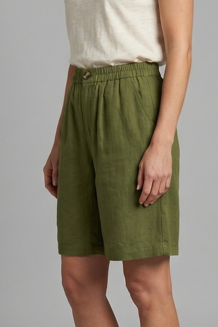 FJØRNA Juniper women's elastic waist relaxed fit shorts, beige color, lightweight fabric, casual style, front and back view.