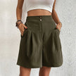 FJØRNA women's lightweight summer shorts with high waist, wide leg, and pleated design shown on a model.