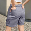 FJØRNA women's high-waist relaxed fit cargo shorts in lightweight summer fabric with elastic waistband, ideal for casual wear.