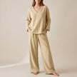 FJØRNA women's two-piece khaki co-ord set with pockets and V-neck design, stylish and comfortable for casual wear.