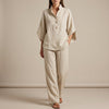 FJØRNA khaki woven two-piece relaxed shirt and wide-leg trouser set for urban leisure, displayed on a hanger.