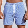 Men's casual striped boardshorts by FJØRNA with a drawstring, side slit hem, and classic blue stripe pattern.