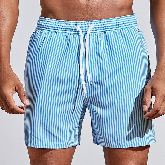 FJØRNA men's casual striped boardshorts in light blue with drawstring and side slit hem, perfect for beach or pool days.